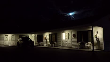 Establishing-shot-of-a-roadside-motel-under-a-full-moon-at-night-2