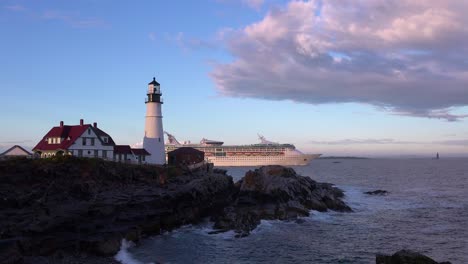 Remarkable-shot-of-the-Portland-Head-Lighthouse-in-Maine-with-cruise-ship-passing-in-distance