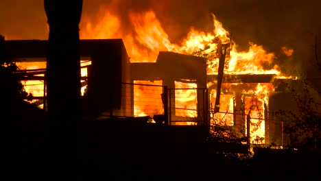 Close-up-of-a-home-burning-in-a-large-inferno-at-night-during-the-2017-Thomas-fire-in-Ventura-County-California-1