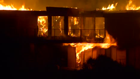 Close-up-of-a-home-burning-in-a-large-inferno-at-night-during-the-2017-Thomas-fire-in-Ventura-County-California-4
