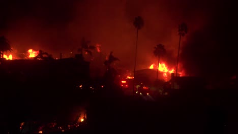 Homes-burn-all-across-hillsides-in-an-inferno-at-night-during-the-2017-Thomas-fire-in-Ventura-County-California