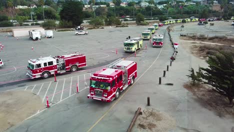 Aerial-of-firefighters-in-fire-trucks-lining-up-for-duty-at-a-staging-area-during-the-Thomas-Fire-in-Ventura-California-in-2017-3
