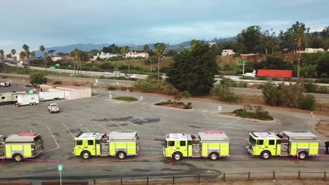 Aerial-of-firefighters-in-fire-trucks-lining-up-for-duty-at-a-staging-area-during-the-Thomas-Fire-in-Ventura-California-in-2017-4
