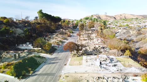 Aerial-over-entire-street-of-hillside-homes-destroyed-by-fire-in-Ventura-California-following-the-Thomas-wildfire-in-2017-6