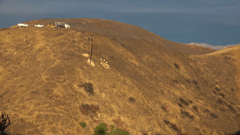 A-SCE-telephone-lineman-maintenance-crew-works-on-power-lines-on-burned-hills-following-the-disastrous-Thomas-Fire-1