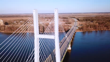 Aerial-of-a-suspension-bridge-crossing-the-Mississippi-River-near-Burlington-Iowa-suggests-American-infrastructure