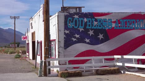 A-roadside-cafe-along-a-remote-highway-and-God-Bless-America-sign