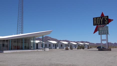 Establishing-shot-of-a-lonely-desert-gas-station-and-hotel-motel-cafe-in-the-Mojave-Desert-1