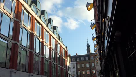 Establishing-shot-of-a-street-in-London-includes-apartments-and-businesses