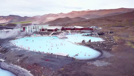 An-aerial-over-a-public-thermal-bath-spa-in-Iceland-near-Myvatn-Editorial-use-only