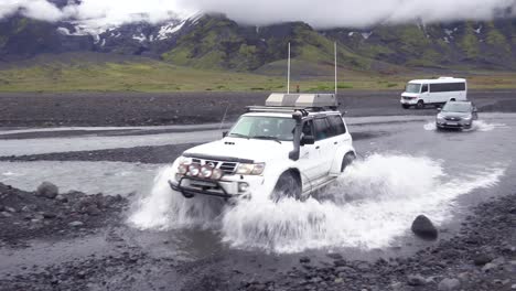 A-4WD-Toyota-Land-cruiser-drives-through-a-river-in-the-remopte-highlands-of-Iceland-near-Thorsmork-1