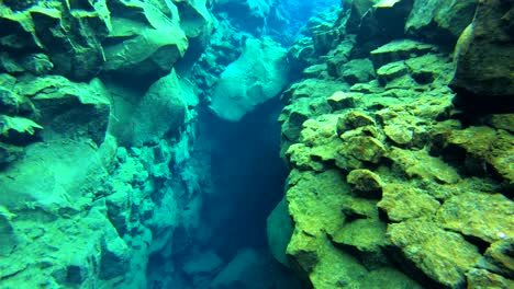 Underwater-diving-snorkeling-footage-following-the-mid-Atlantic-ridge-fissure-in-Thingvellir-Iceland