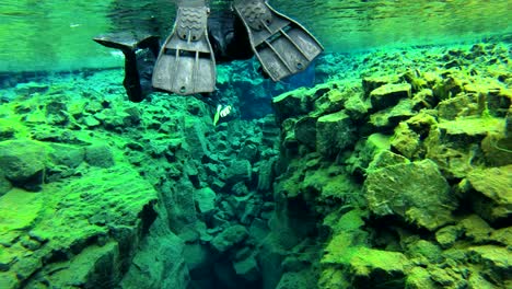 Underwater-diving-snorkeling-footage-following-the-mid-Atlantic-ridge-fissure-in-Thingvellir-Iceland-4