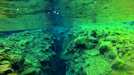 Underwater-diving-snorkeling-footage-following-the-mid-Atlantic-ridge-fissure-in-Thingvellir-Iceland-5