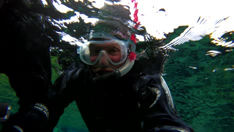 Underwater-diving-snorkeling-footage-following-the-mid-Atlantic-ridge-fissure-in-Thingvellir-Iceland-6