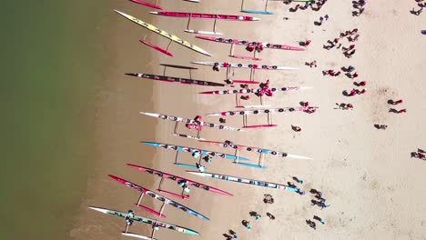 Aerial-over-outrigger-canoes-on-a-beach-during-a-rowing-race-on-the-Pacific-ocean-near-Ventura-California-3