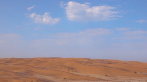 Nice-timelapse-of-the-Namib-desert-and-dunes-with-blue-sky-and-clouds-overhead-Namibia