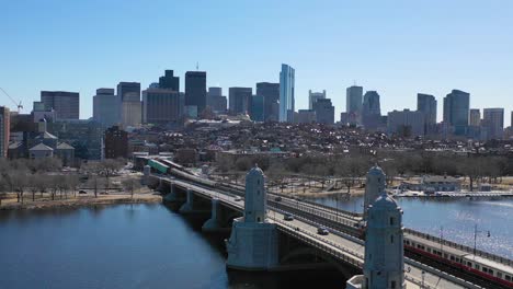 Aerial-establishing-city-skyline-of-Boston-Massachusetts-with-Longfellow-bridge-and-subway-train-crossing-5