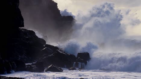 Extreme-slow-motion-of-beautiful-ocean-waves-crashing-into-Kaiaka-Rock-Molokai-Hawaii-7