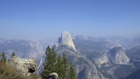 Horizontal-pan-Half-Dome-and-the-High-Sierra-Mountain-Range-from-Washburn-Point-Yosemite-National-Park-California