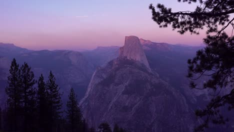 Magenta-alpen-glow-after-sunset-on-Half-Dome-and-High-Sierra-Nevada-Mountains-from-Washburn-Point-Yosemite-NP-1