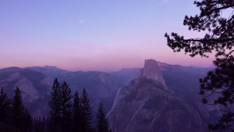 Magenta-alpen-glow-after-sunset-on-Half-Dome-and-High-Sierra-Nevada-Mountains-from-Washburn-Point-Yosemite-NP-2