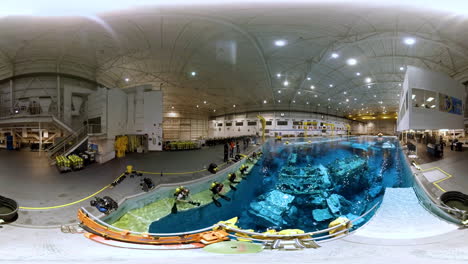 Astronauts-Train-For-Weightlessness-In-A-Pool-At-Nasa-Johnson-Space-Center