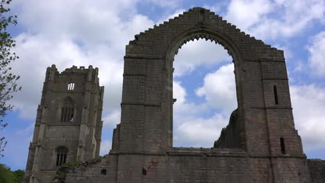 A-timelapse-shot-of-clouds-moving-behind-Fountains-Abbey-in-England