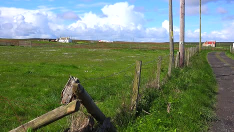 Beautiful-thunderhead-clouds-form-behind-remote-farms-near-John-O\'Groats