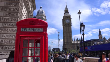 An-iconic-red-telephone-booth-in-front-of-Big-Ben-and-Houses-Of-Parliament-in-London-England