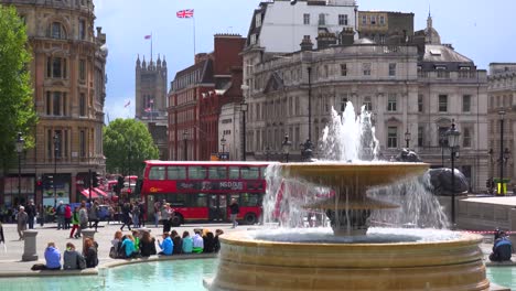 An-establishing-shot-of-Trafalgar-Square-London-England-with-fountain-foreground