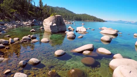 An-aerial-shot-over-beautiful-boulders-and-clear-water-in-Lake-Tahoe-Nevada