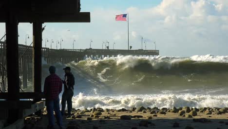 Huge-waves-crash-on-a-California-beach-and-pier-during-a-very-large-storm-event-10