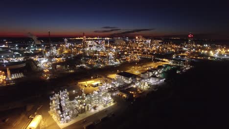 Excellent-aerial-over-huge-industrial-oil-refinery-at-night