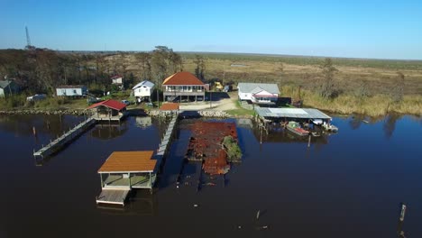 An-aerial-stationary-shot-over-the-Louisiana-bayou-reveals-a-local-community