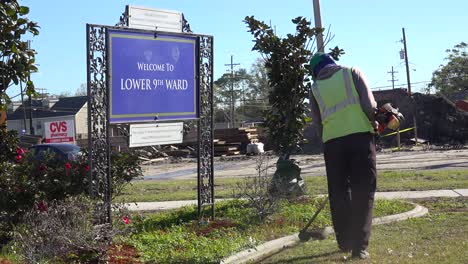 Workers-clean-up-and-beautify-the-Lower-9th-Ward-of-New-Orleans-Louisiana-post-Katrina