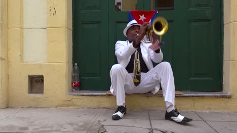 A-jazz-musician-plays-a-trumpet-on-the-streets-of-Havana-Cuba