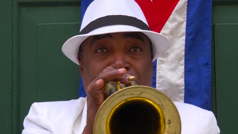 A-jazz-musician-plays-a-trumpet-on-the-streets-of-Havana-Cuba-1