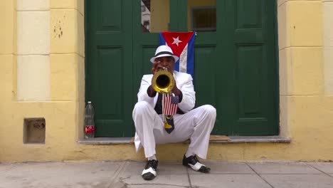 A-jazz-musician-plays-a-trumpet-on-the-streets-of-Havana-Cuba-2