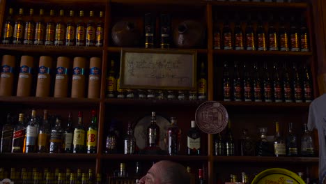 Lots-of-rum-on-the-shelves-of-Cuban-bar-in-Havana