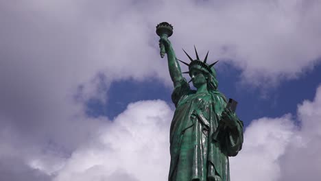 A-patriotic-shot-of-the-Statue-Of-Liberty-against-a-cloudy-sky-1