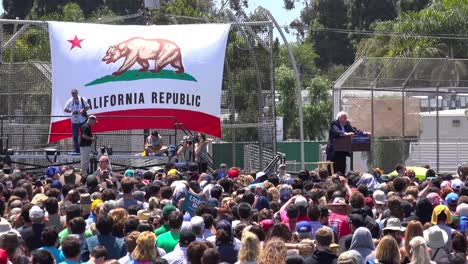 Bernie-Sanders-speaks-in-front-of-a-huge-crowd-at-a-political-rally-about-the-minimum-wage