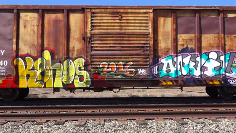 Colorful-graffiti--is-seen-on-parked-railway-boxcars