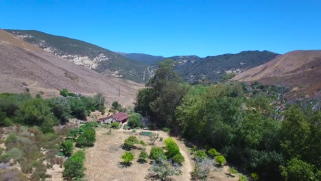 A-long-aerial-flight-over-a-deep-canyon-nature-reserve-in-Santa-Barbara-county-California