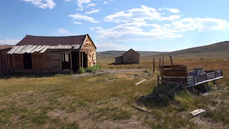 An-old-abandoned-wagon-sits-in-the-field-in-the-remarkable-ghost-town-of-Bodie-California