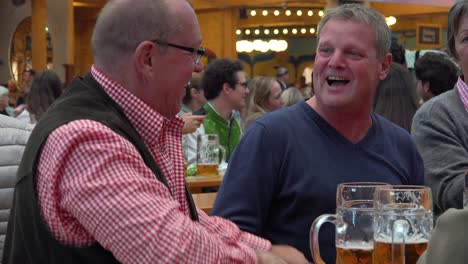 Two-men-hug-at-Oktoberfest-Germany