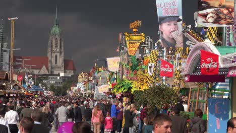 Huge-crowds-of-people-attend-Oktoberfest-in-Munich-Germany-against-a-gathering-storm