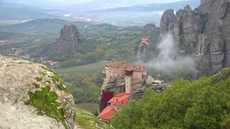 Fog-rises-in-the-morning-around-the-beautiful-monasteries-of-Meteora-Greece-1