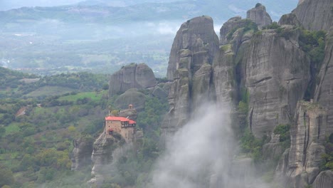 Fog-rises-in-the-morning-around-the-beautiful-monasteries-of-Meteora-Greece-2