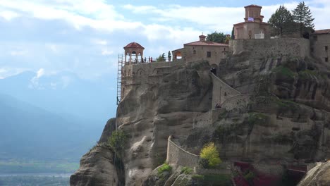 A-monastery-in-Meteora-Greece-overlooks-a-valley-below